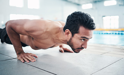 Image showing Fitness, push up or man by a swimming pool training, workout or exercising for body goals with focus. Wellness, exercise or healthy young sports athlete with strong arms, endurance or motivation