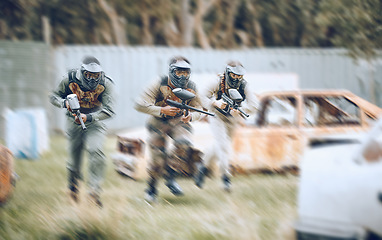 Image showing Paintball, team work or men running in a shooting game with speed or fast action on a fun battlefield. Mission focused, military or people running with weapons or guns for survival in a competition