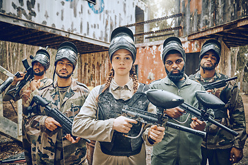 Image showing Paintball, team portrait and woman leader with gun for sports game, competition or action challenge. Diversity men and female group for military, soldier or army mission in outdoor war battlefield