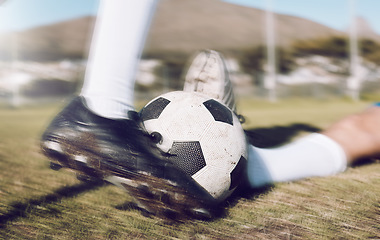 Image showing Soccer, shoes and ball with motion blur, fitness on sports field, action and speed, tackle and training outdoor. Football player with match, people play team sport and energy with exercise closeup