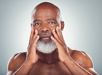 Image showing Beard, skincare and senior man grooming and self care routine isolated in studio gray background. Facial, moisture and portrait of old person or model with smooth glow skin or face for wellness