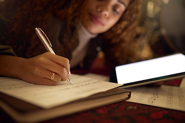 Image showing Tablet, paper and black woman writing music notes for song lyrics, audio and create track beat. Musician, creative studio and hand of girl write on sheet with mockup digital screen for musical app