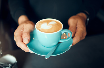 Image showing Barista hands, coffee and foam heart for customer, waiter working and server in small business restaurant. Man, creative shape in cappuccino or milk latte mug from espresso machine in cafe shop