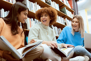 Image showing Friends, students in library with books for education, university group of women, funny and studying together. Laughter, diversity and young, research for paper or exam with motivation and reading