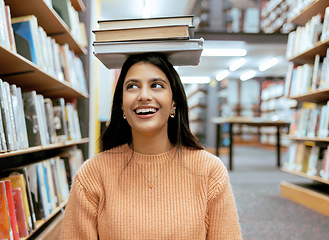 Image showing Books, balance or happy student in a library reading for knowledge or development for future growth. Scholarship, portrait or funny school girl smile while studying or learning college information