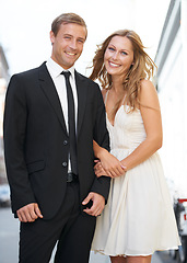 Image showing Valentines date, love and couple portrait with a smile ready for romance and happiness on a street. Suit, smile and happiness of a fancy woman and man together with care on dates for engagement