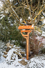 Image showing simple birdhouse in winter garden