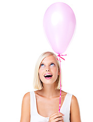 Image showing Balloon, excited and young woman with birthday or valentines day present in studio. Isolated, white background and cute model with happiness and joy thinking with optimism and smile for party