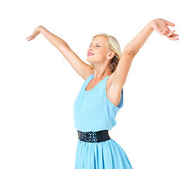 Image showing Happiness, woman and opening arms for freedom, peace and happy with lady isolated on a white studio background. Young lady and girl carefree, calm and joyful with gesture for celebration and smile