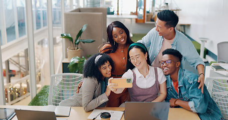 Image showing Creative business people, phone and smile for selfie, team get together or about us showing peace sign at the office. Group of happy employee workers smiling for group photo on smartphone for startup