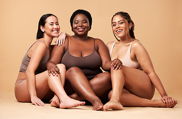 Image showing Diversity, women friends and body portrait with skin glow group together for inclusion, beauty and power. Underwear model people on beige background with a smile, pride and motivation for self love