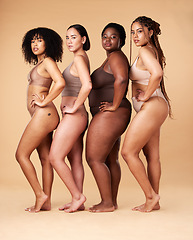 Image showing Body positivity, skin and portrait of women group together for inclusion, beauty and power. Aesthetic model friends on beige background with underwear cellulite, pride and motivation for self love