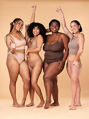 Image showing Diversity women, celebration and body portrait of friends group together for inclusion, beauty and power. Underwear model people on beige background with cellulite, pride and motivation for self love