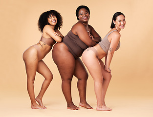 Image showing Diversity women, body size and portrait of group together for inclusion, beauty and power. Underwear model friends happy on beige background with cellulite legs, skin pride and self love motivation