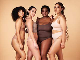 Image showing Body, skin and diversity women portrait of group together for inclusion, beauty and power. Underwear model friends hug on beige background with skincare, color pride and motivation for self love