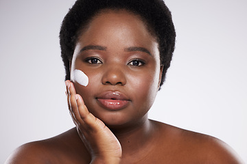 Image showing Black woman, skincare cream and studio portrait for cosmetic beauty, pride and happiness by background. Facial health product, young african model and natural skin glow with self care dermatology