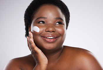 Image showing Cream, face and beauty black woman isolated on a white background for skincare, product or cosmetics smile. African model or person with facial lotion, collagen .or dermatology sunscreen in studio