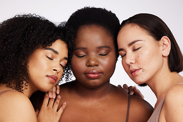 Image showing Women, diversity and studio with eyes closed for trust, support and inclusion with beauty aesthetic. Model, asian and black woman with cosmetics, makeup and wellness with skin health by background