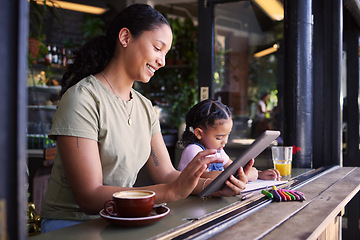 Image showing Black family, children and mother remote working at a cafe together with her daughter coloring in a book. Tablet, internet or coffee shop with a woman freelancer and her female child at a restaurant