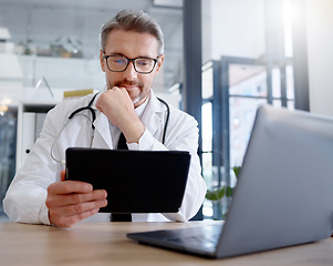 Image showing Tablet, medical doctor and man in hospital for telehealth, online consultation and healthcare. Clinic technology, wellness app and mature male physician with digital touchscreen for health research.