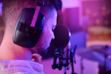 Image showing Musician, singer or face on neon microphone, headphones studio or theatre practice in night recording. Zoom, man or singing pop artist on production, voice media or sound performance in light theater