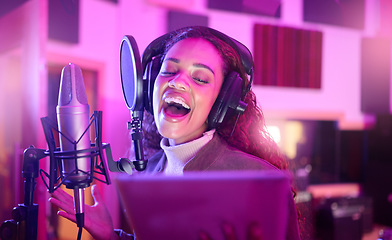 Image showing Technology, singing or musician on neon microphone, music studio lyrics or songwriting app in night recording. Singer, woman or artist on tablet in production, voice media or sound light performance