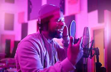 Image showing Musician, singing or black man on neon studio microphone, music equipment or practice in night theatre recording. Singer, person or artist on production, voice or sound performance in light theater