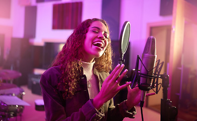 Image showing Musician, singing or woman on neon studio microphone, music equipment or practice in night theatre recording. Singer, person or artist on production, voice media or sound performance in light theater