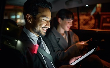 Image showing Tablet, business people and man travel in car while on social media, internet browsing or web scrolling. Transport, night and male and woman with mobile technology for networking, typing or texting.