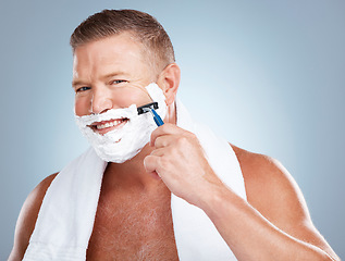 Image showing Razor shave, man smile and portrait with cream for face cleaning, wellness and skincare. Morning grooming, foam and model with facial care and skin treatment for shaving hair in a studio isolated