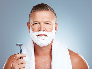 Image showing Portrait, razor and old man shaving in studio with foam, skincare or beauty on grey background. Face, blade and mature male model relax for luxury, hair removal and facial, skin and product isolated