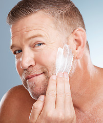 Image showing Old man, portrait and shaving cream product in studio for skincare, grooming and grey background. Face, foam and skin treatment by mature male model relax with luxury, hair removal and beard care