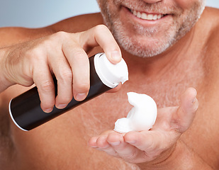 Image showing Epilation, shaving cream and male in a studio for a hygiene, skincare and grooming face routine. Health, wellness and mature man with hair removal foam for a facial, self care and beauty treatment.