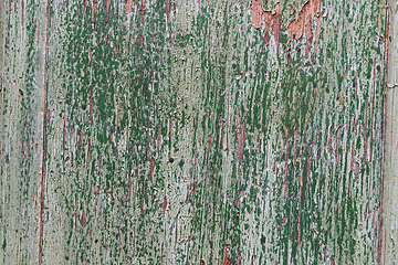 Image showing green peeled off paint on wood