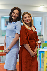 Image showing Portrait of a two teacher in a preschool institution, in the background of the classrooms