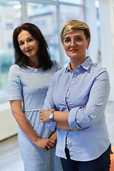 Image showing Portrait of a two teacher in a preschool institution, in the background of the classrooms