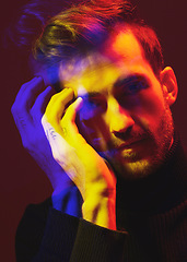 Image showing Double exposure, color and portrait of a man with overlay isolated on a dark background in studio. Texture, design and face of a man with colorful art, creativity and futuristic person on a backdrop