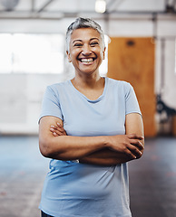 Image showing Senior black woman, gym and smile portrait of a person happy about fitness and exercise. Sports, happy and pilates fitness studio of mature female with arms crossed proud about wellness and health