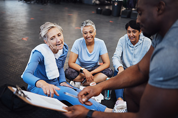 Image showing Senior woman, talking and personal trainer contract with elderly friends ready for wellness. Sports checklist, gym document and workout group with happiness in a training gym floor for fitness