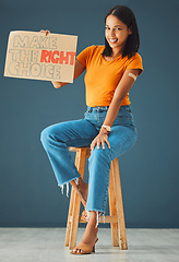 Image showing Woman, vaccine poster and studio portrait with smile, stop covid and healthcare opinion on cardboard. Happy gen z girl, billboard or wellness decision with plaster, sign and happy for safety in home