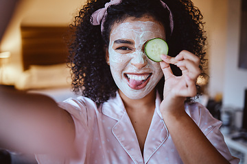 Image showing Selfie, portrait and cucumber for skincare by woman, happy and emoji, fun and silly while grooming, mask or facial. Face, fruit and girl with tongue out for photo, beauty or routine with eco product