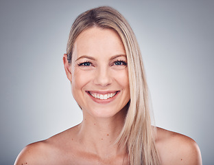 Image showing Woman, portrait and happy with hair and beauty, hairstyle cosmetic care and smile isolated on studio background. Makeup, natural cosmetics and keratin treatment, dermatology and shine with skincare