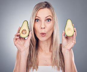 Image showing Avocado, beauty and skin or hair care woman portrait in studio with natural cosmetic and shampoo shine. Face of aesthetic model excited on grey background for hairdresser or wow sustainable product