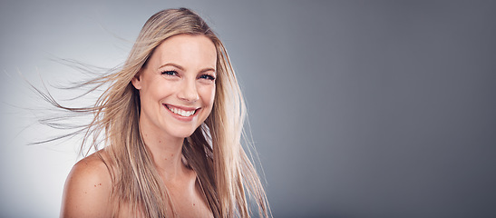 Image showing Beauty, hair care and woman portrait with space for mockup in studio with natural makeup cosmetics. Face of aesthetic model person on a grey background for hairdresser or salon shampoo for shine