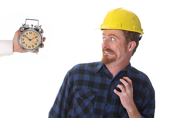 Image showing construction worker looking at his watch