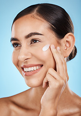 Image showing Beauty, face and skincare for a woman with hand for dermatology, cosmetics and natural glow. Aesthetic model person happy about spa facial self care results for health and wellness on blue background