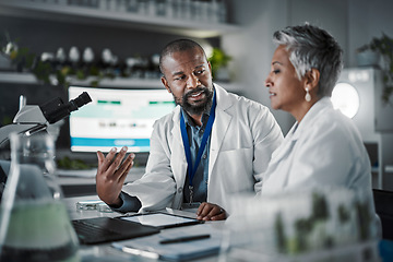 Image showing Lab discussion, tablet and science teamwork for research at desk with data analytics for plants, goal or growth. Mature scientist woman, mobile touchscreen ux or black man with agriculture innovation