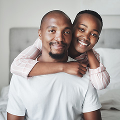 Image showing Portrait, love and black couple in bedroom, smile and romance for Valentines day, affection and hug. Romantic, man and woman embrace on bed, loving and bonding on weekend break and relax together