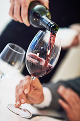 Image showing Hands, glass and waiter pouring wine for serving, catering or working at restaurant for customer service. Hand of diner worker providing alcohol in champagne glasses for hospitality or fine dining