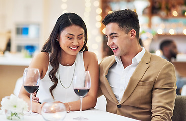 Image showing Love, couple and in restaurant with smile, celebration and quality time together, happiness and affection. Romance, man and woman with fine dining, wine glasses and romantic with bonding and loving